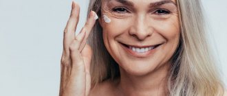 A woman applies blepharogel for wrinkles