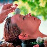 Facial massage with herbal bags